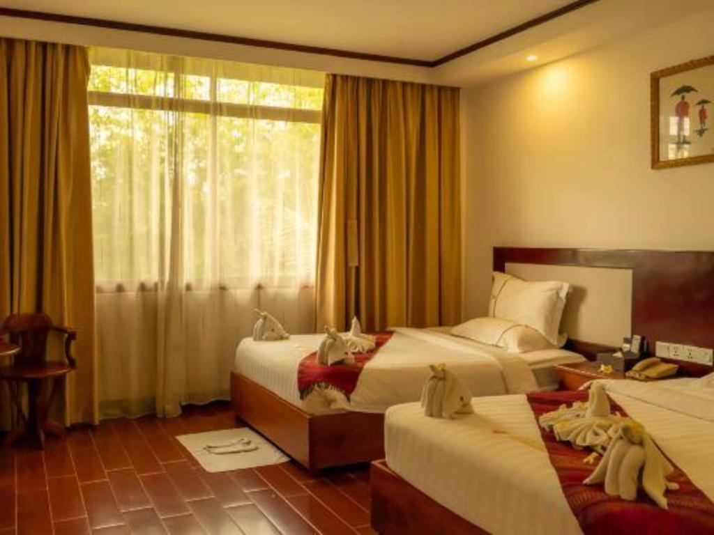 Xishuangbanna Hotel Managed By Xandria Hotel Luang Prabang Exterior foto